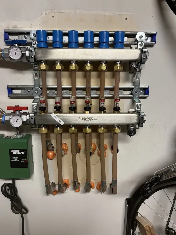 Plumber performing Water Heater Repair at a residential property in Riverton